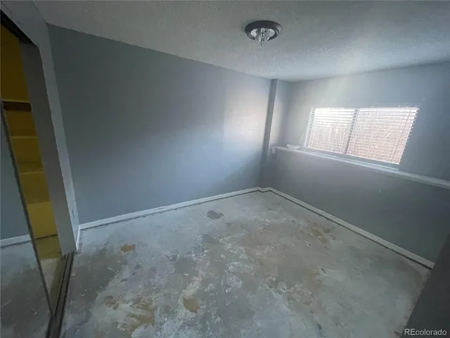 an empty room with window
