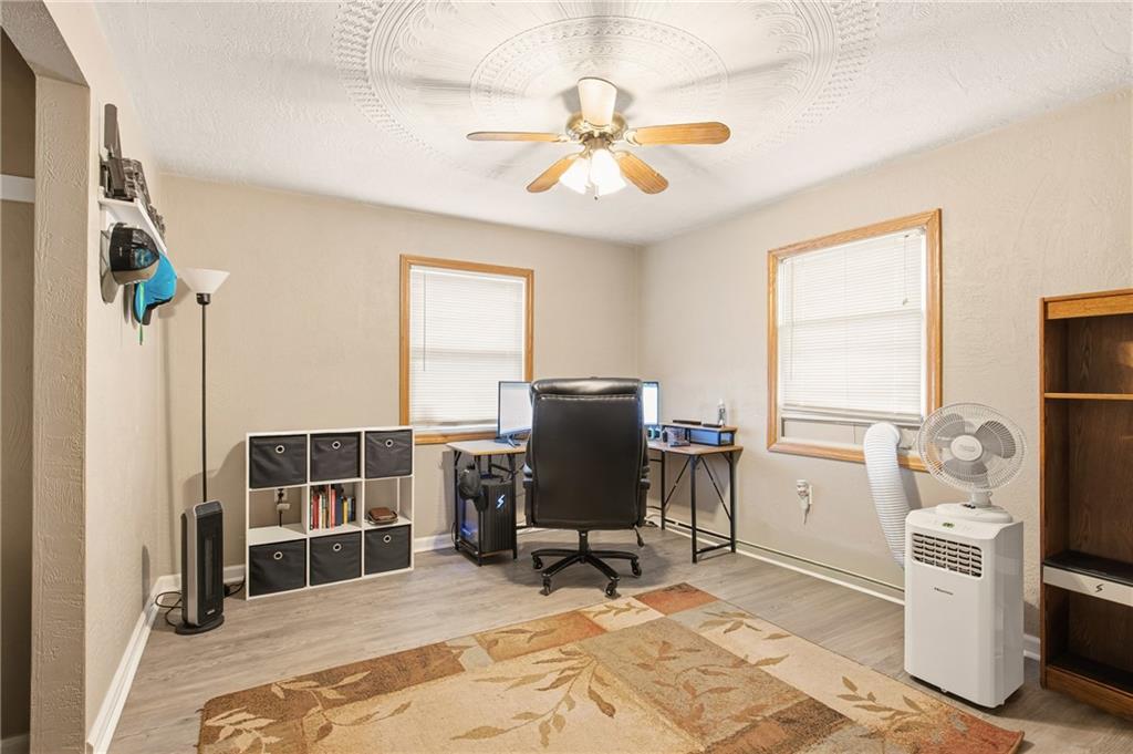 36 3rd Street Cairnbrook, PA 15924 - Photo 24 of 50 a view of a workspace with furniture and a window