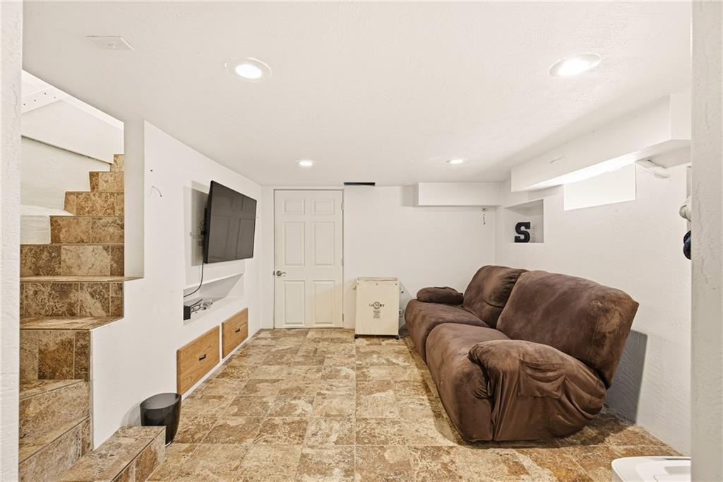 36 3rd Street Cairnbrook, PA 15924 - Photo 35 of 50 a living room with furniture and a flat screen tv