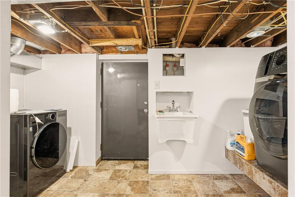 36 3rd Street Cairnbrook, PA 15924 - Photo 36 of 50 a utility room with dryer and washer