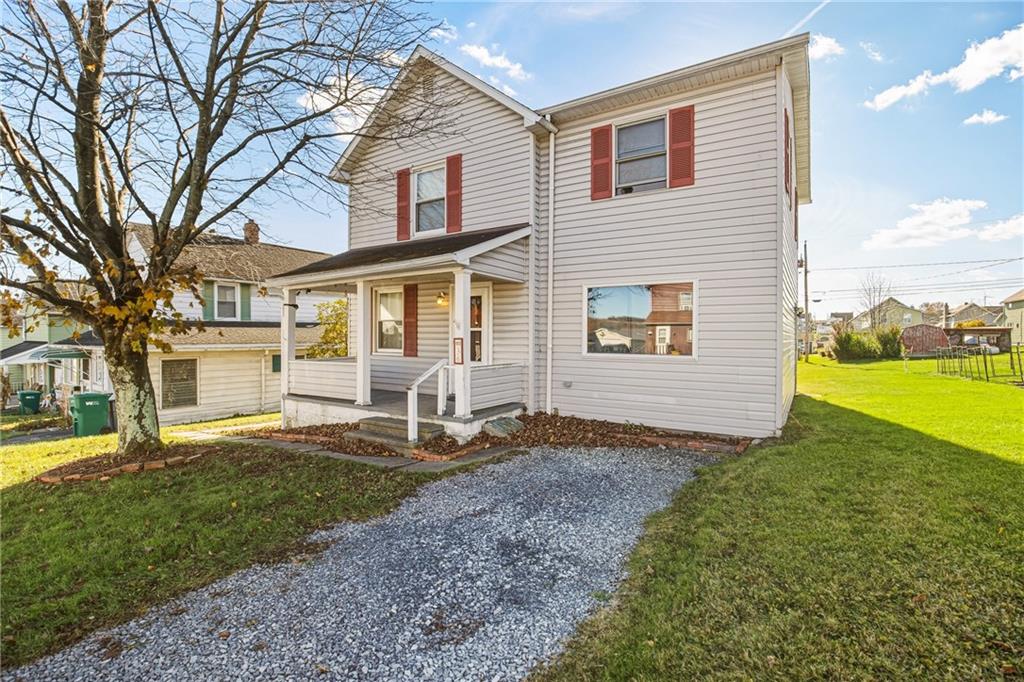 36 3rd Street Cairnbrook, PA 15924 - Photo 4 of 50 a front view of a house with garden