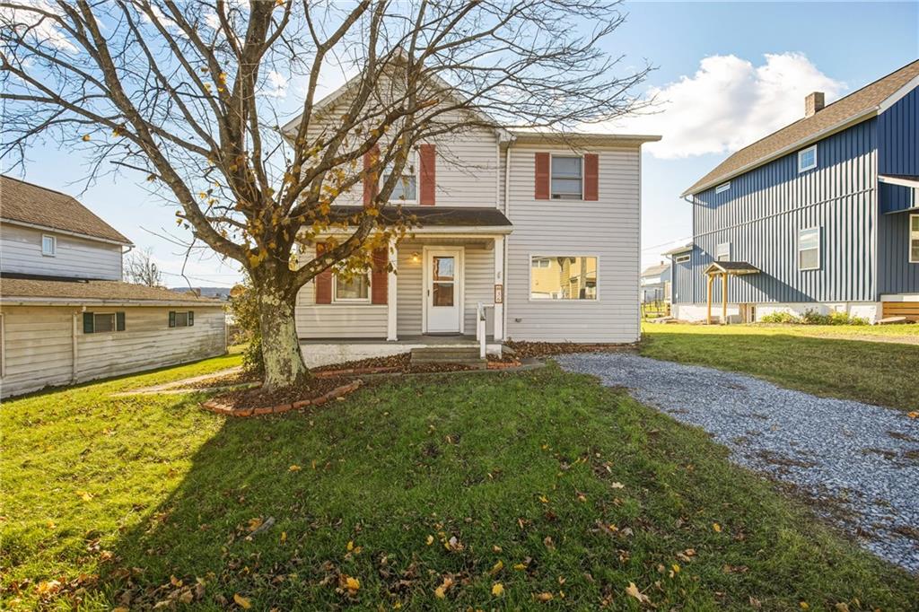 36 3rd Street Cairnbrook, PA 15924 - Photo 6 of 50 a front view of a house with garden