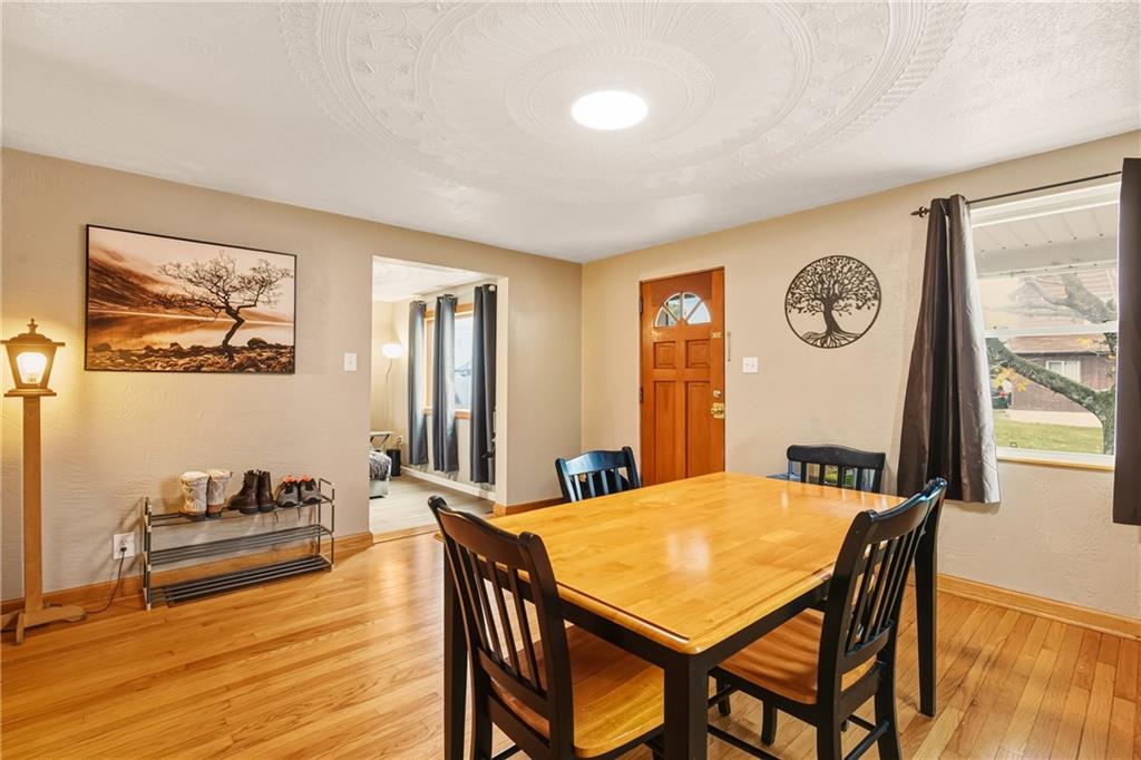 36 3rd Street Cairnbrook, PA 15924 - Photo 10 of 50 a view of a dining room with furniture and wooden floor