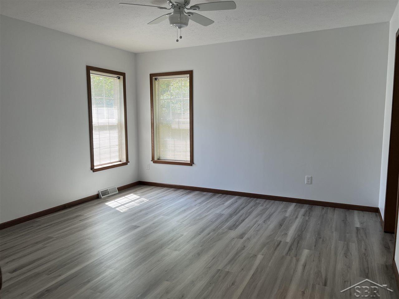 2290 South 5 Mile Road Midland, MI 48640 - Photo 17 of 23 Primary Bedroom