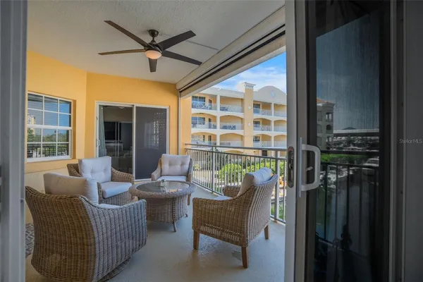 a balcony with furniture