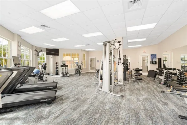a lobby with furniture and a table