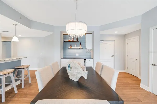 a view of a living room and wooden floor
