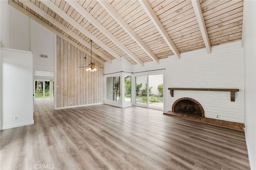 46 Cedar Tree Lane Irvine, CA 92612 - Photo 8 of 44 a view of a room with wooden floor and roof