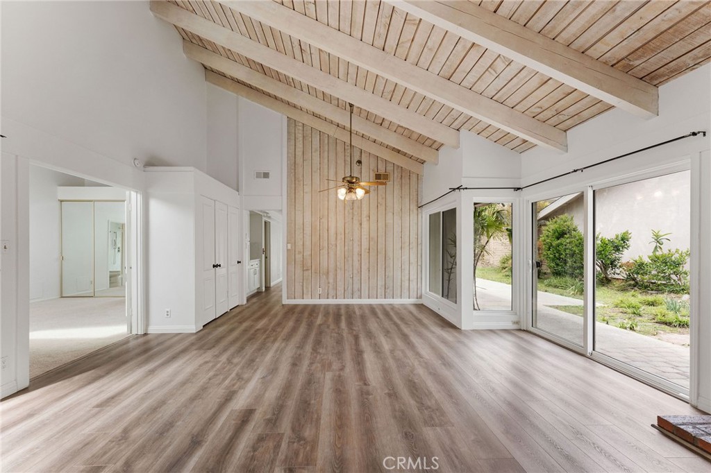 46 Cedar Tree Lane Irvine, CA 92612 - Photo 9 of 44 wooden floor in an empty room with a window
