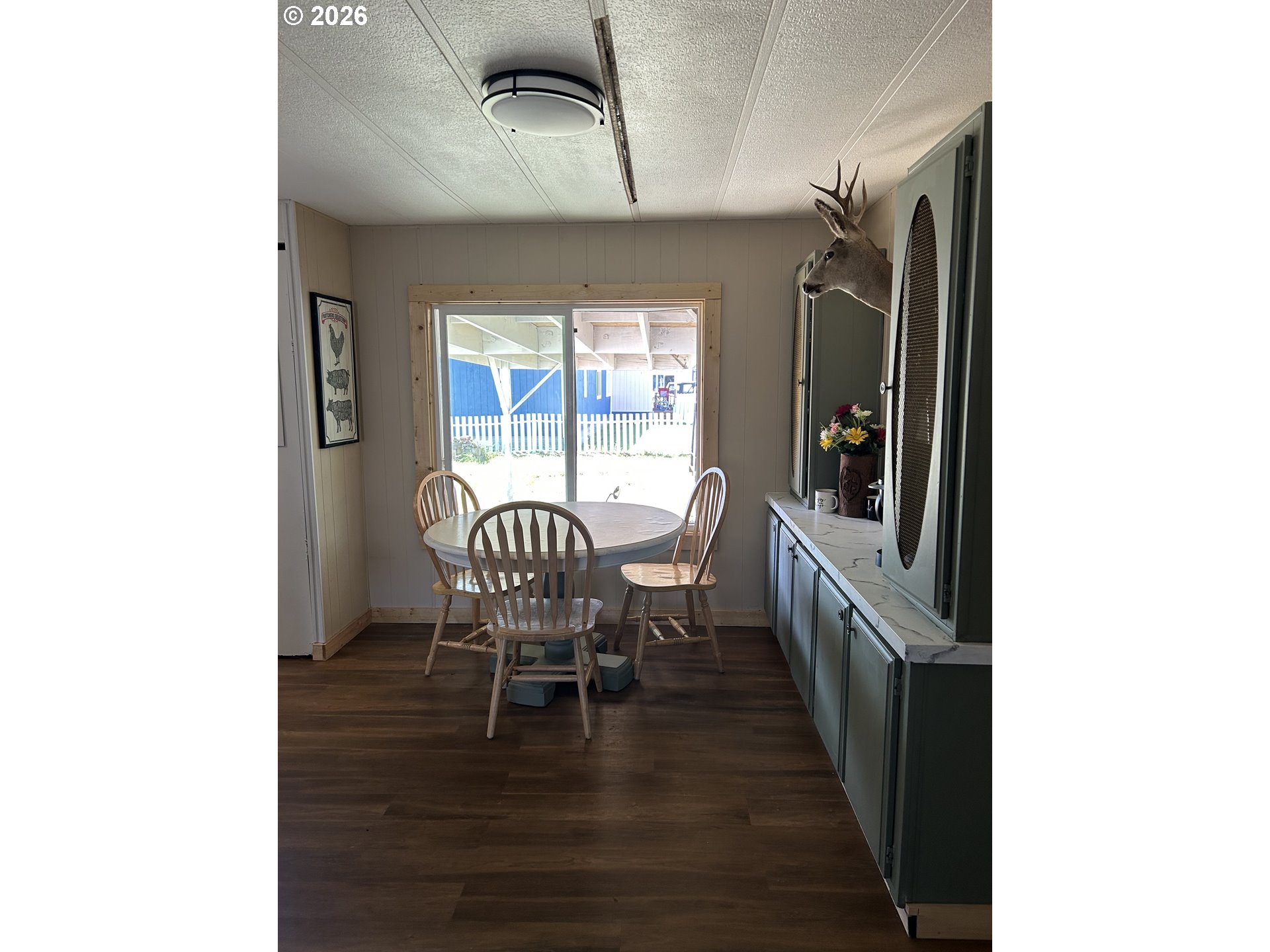 355 North 8th Street Lakeside, OR 97449 - Photo 10 of 22 a view of a dining room with furniture and window