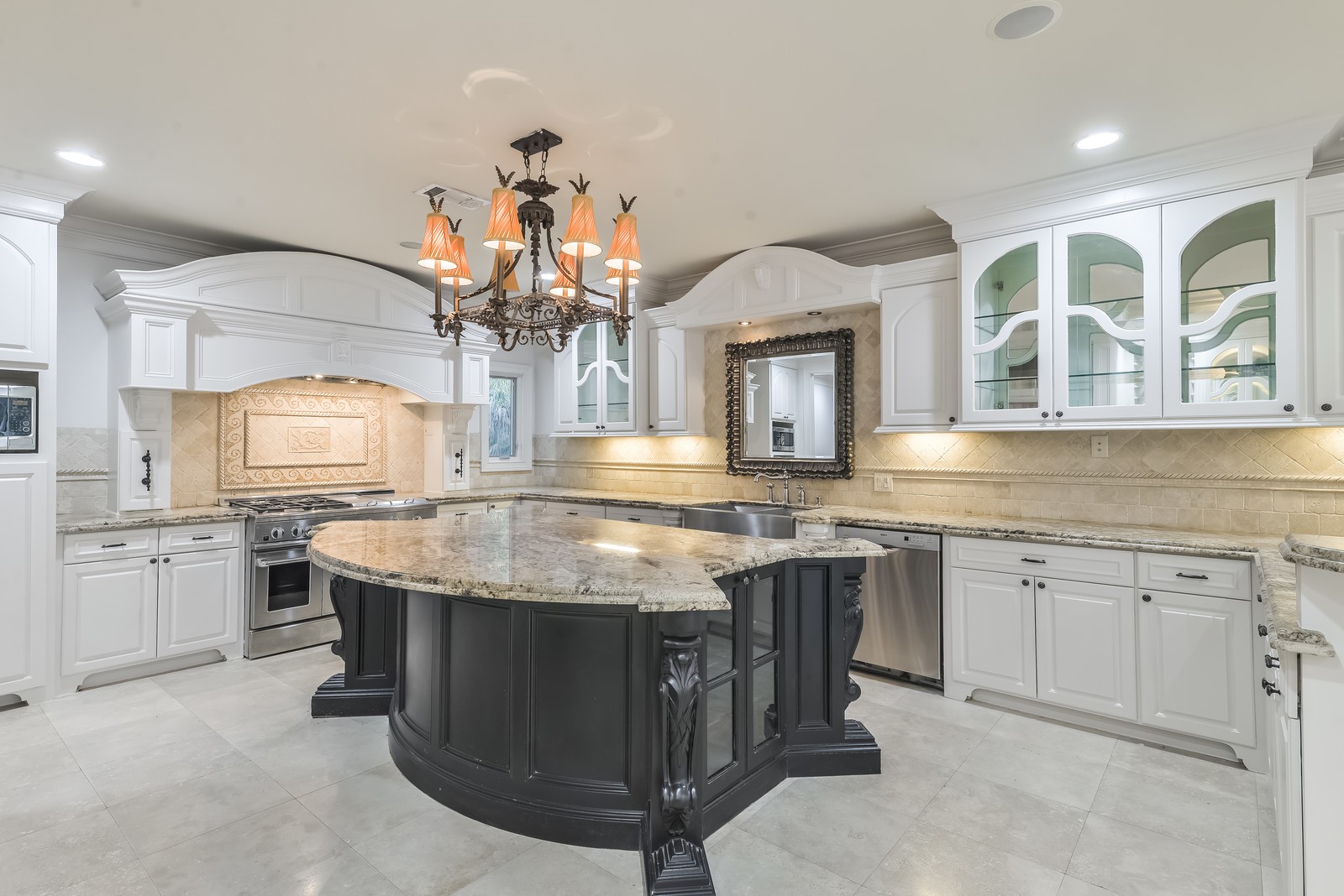 15 West Shady Lane, Unit B Houston, TX 77063 - Photo 12 of 18 a kitchen with a sink stove and cabinets