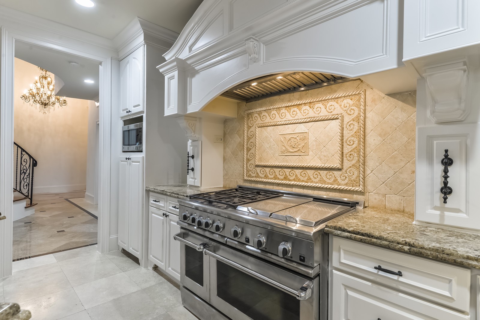 15 West Shady Lane, Unit B Houston, TX 77063 - Photo 13 of 18 a kitchen with granite countertop a stove and a refrigerator