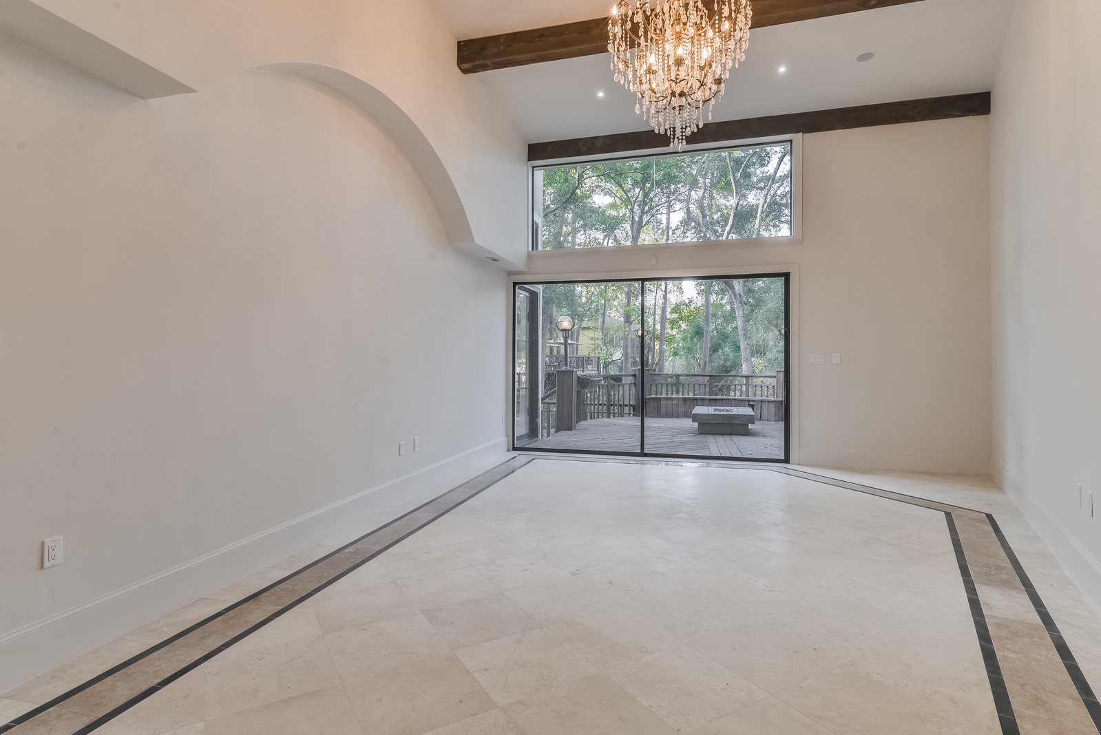 15 West Shady Lane, Unit B Houston, TX 77063 - Photo 9 of 18 a view of an empty room with a window