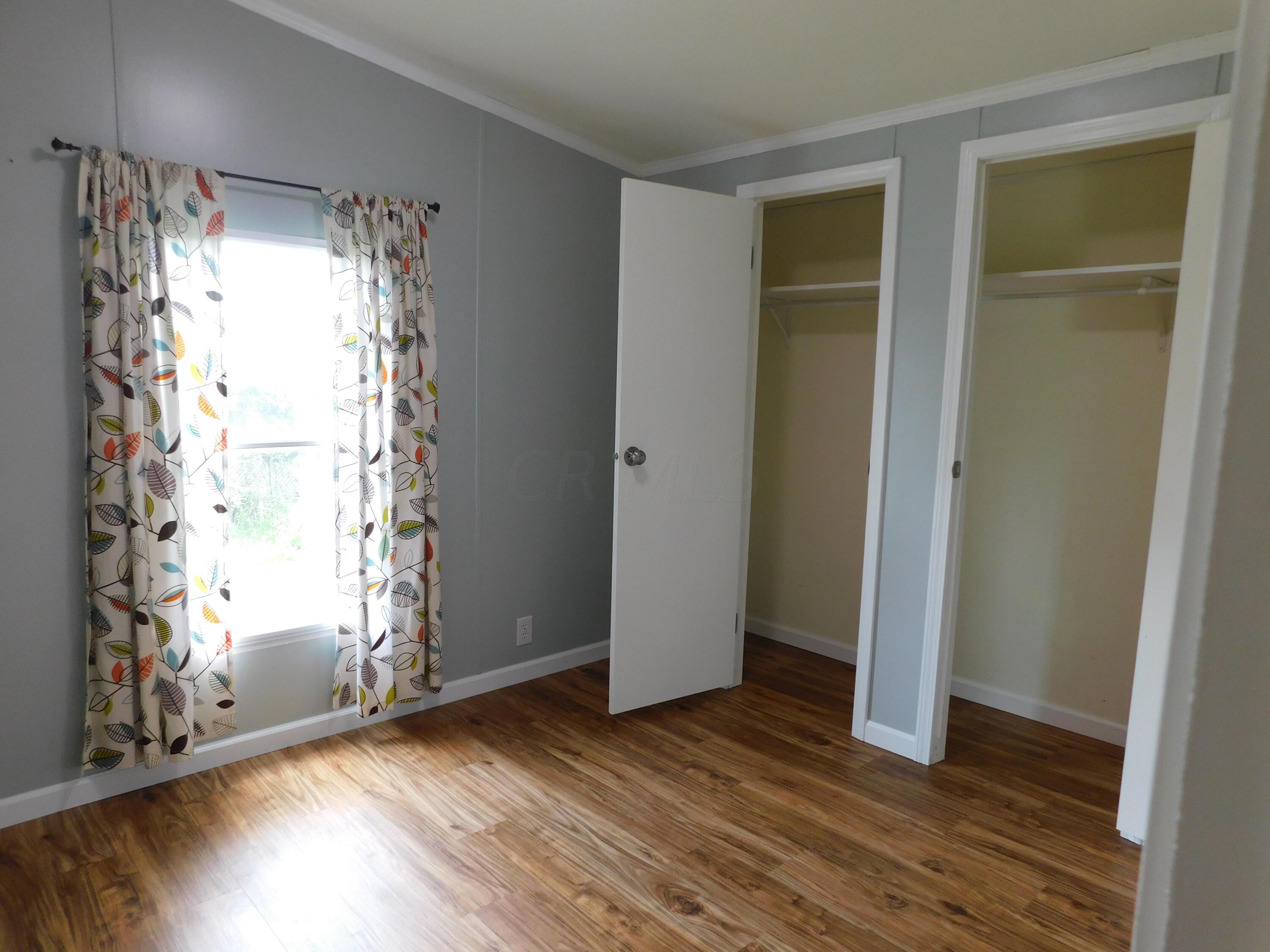 4711 Walnut Road, Unit LOT H8 Buckeye Lake, OH 43008 - Photo 22 of 42 Bedroom #2 featuring a large closet with 2 separate doors
