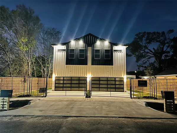 a front view of a house with a garage