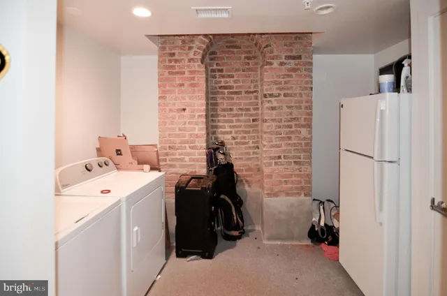 a bathroom with a bathtub and a toilet