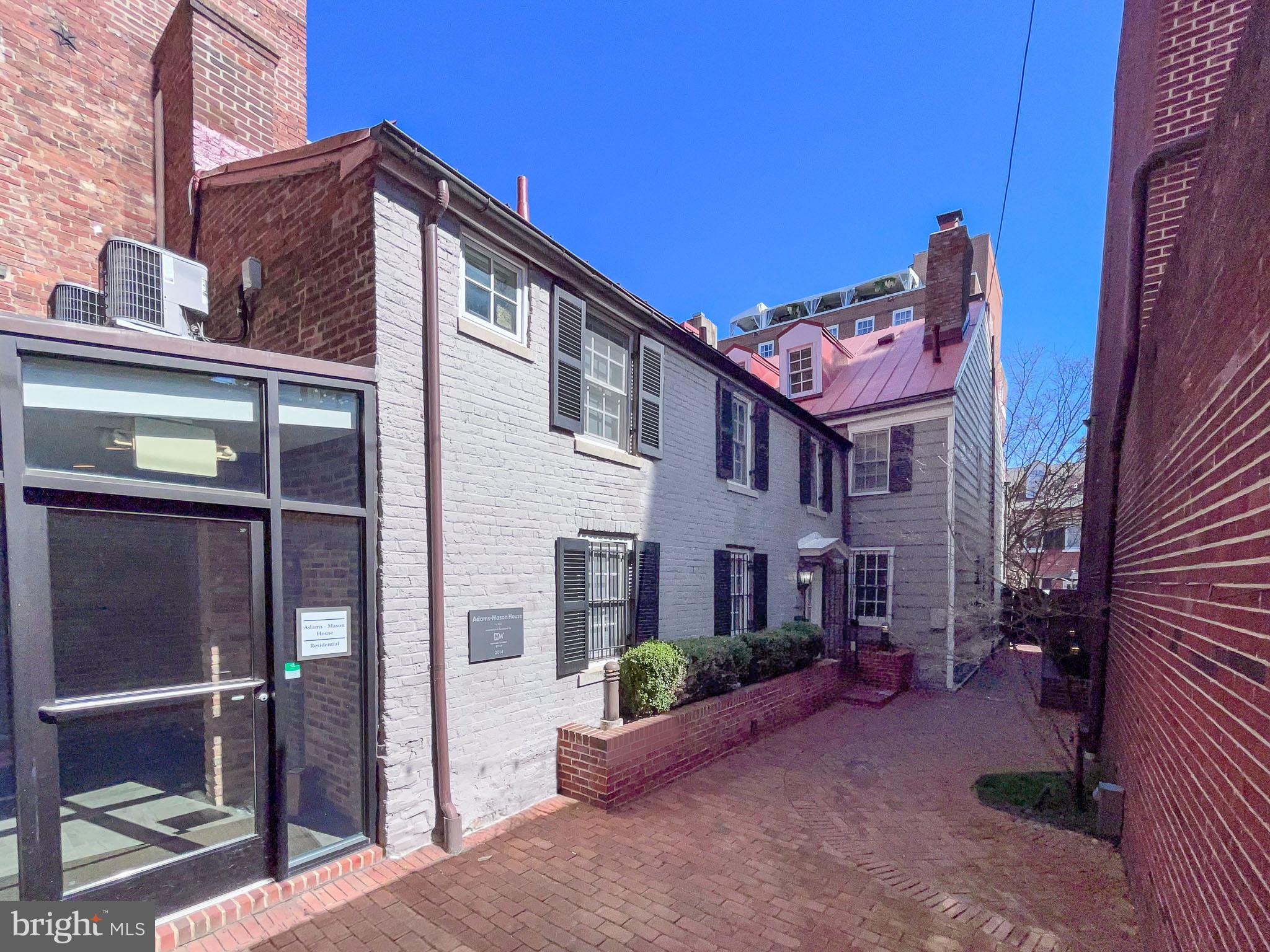 1072 Thomas Jefferson Street Northwest Washington, DC 20007 - Photo 2 of 58 a front view of a house with a garage