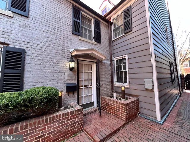 a front view of a house with a stairs