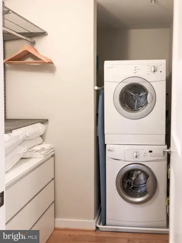 a bathroom with a sink a toilet and shower curtain