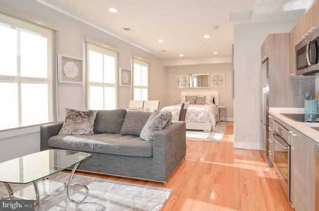a view of a kitchen and a window