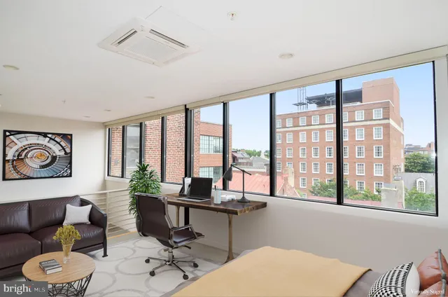 a bathroom with a shower and a toilet