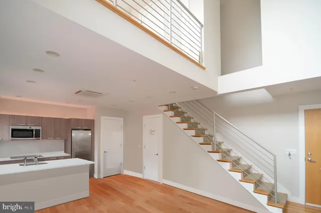 a bathroom with a shower and a toilet