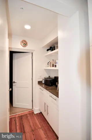 a kitchen with stainless steel appliances granite countertop a stove and a refrigerator