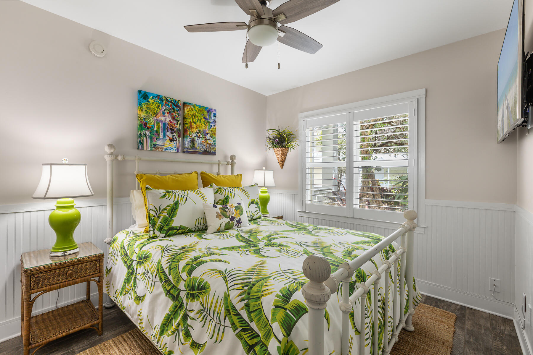 404 Porter Lane, Unit 16 Key West, FL 33040 - Photo 14 of 22 a bed sitting in a bedroom next to a window