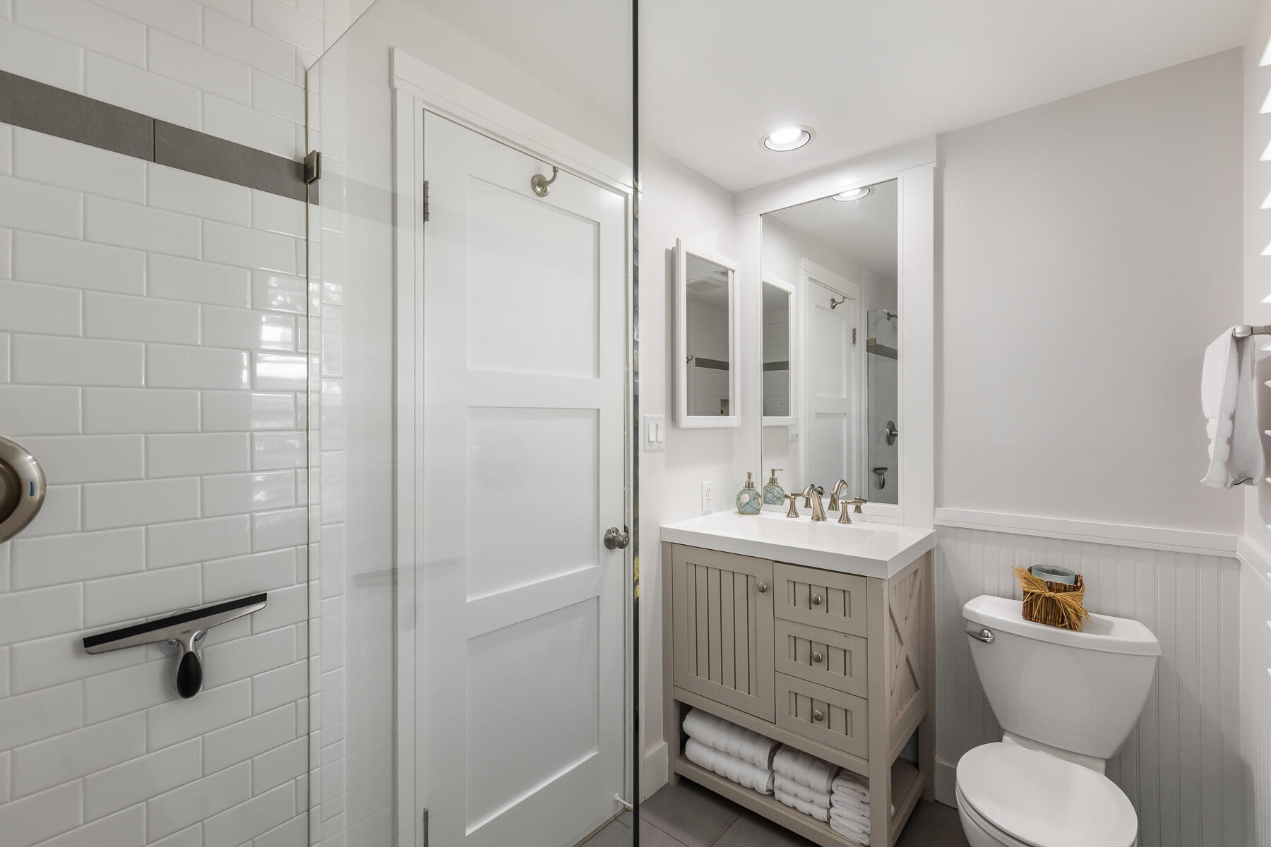 404 Porter Lane, Unit 16 Key West, FL 33040 - Photo 15 of 22 a bathroom with a toilet sink shower and mirror