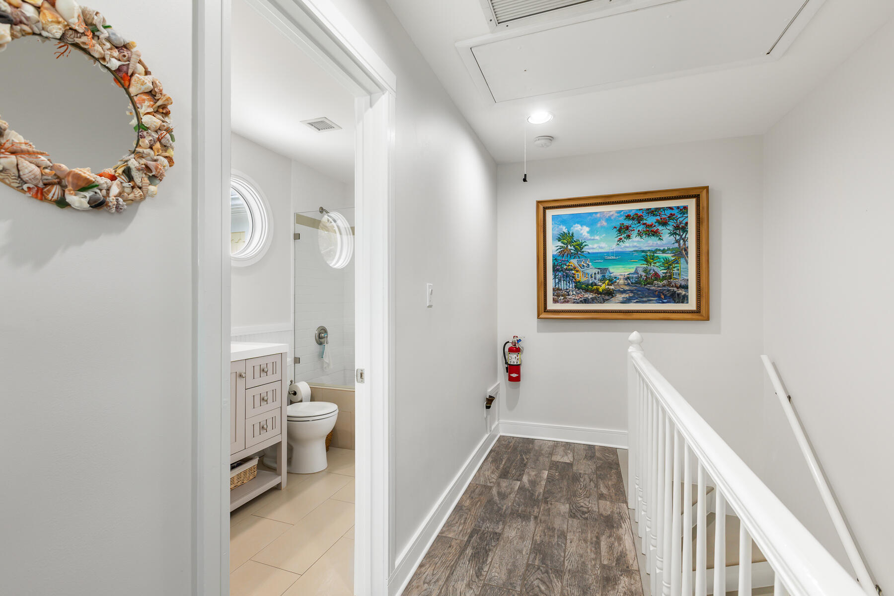 404 Porter Lane, Unit 16 Key West, FL 33040 - Photo 18 of 22 a view of a hallway with bathroom and a bathroom