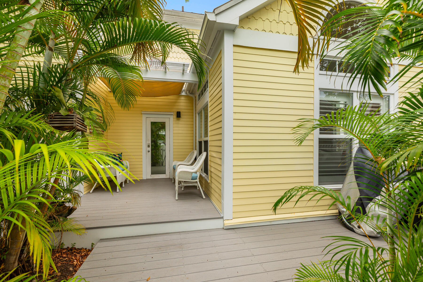 404 Porter Lane, Unit 16 Key West, FL 33040 - Photo 20 of 22 a view of house with a outdoor seating