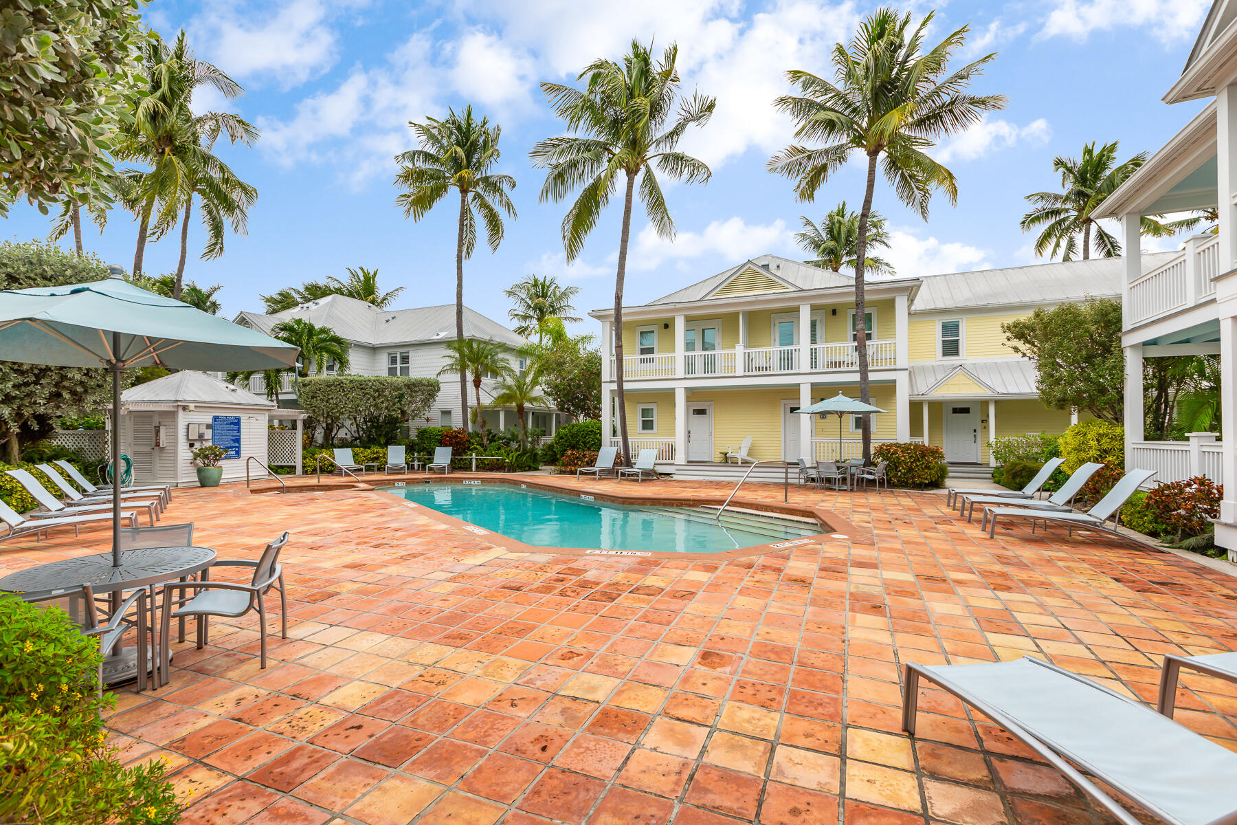 404 Porter Lane, Unit 16 Key West, FL 33040 - Photo 22 of 22 a view of a house with swimming pool and sitting area