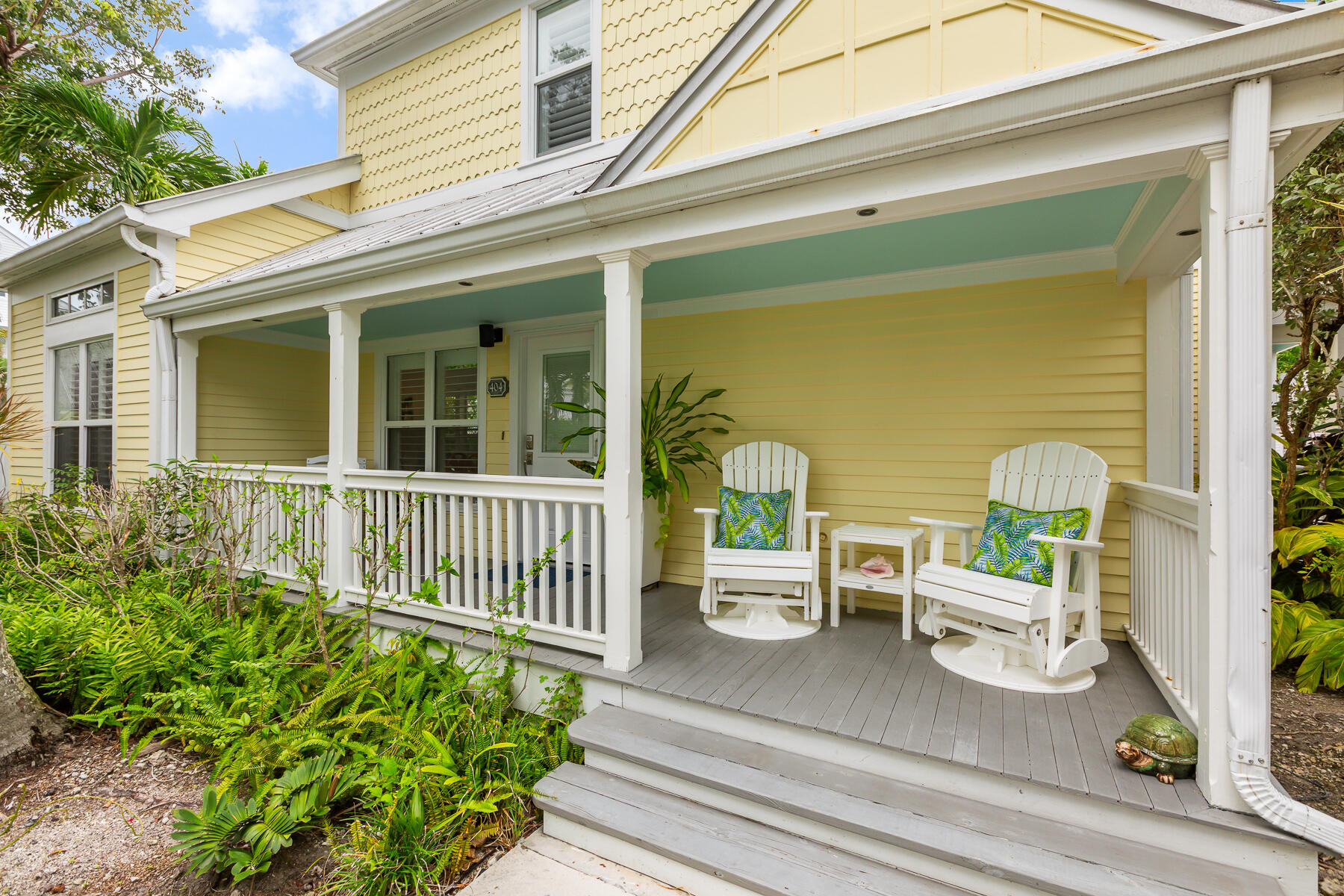 404 Porter Lane, Unit 16 Key West, FL 33040 - Photo 3 of 22 front view of a house with a porch