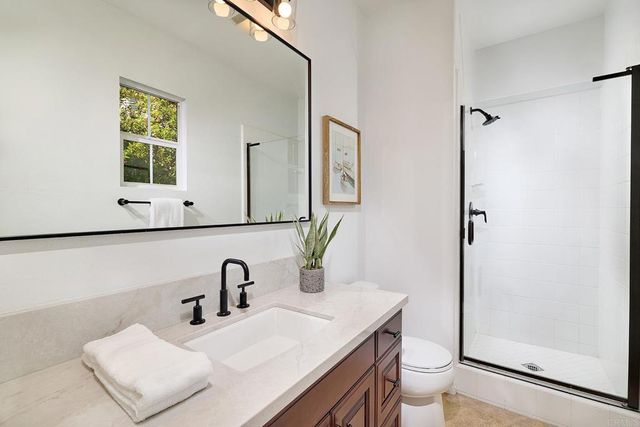 a bathroom with a sink and a toilet