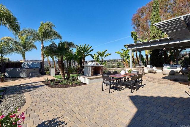 a view of outdoor space with seating area and entertaining space