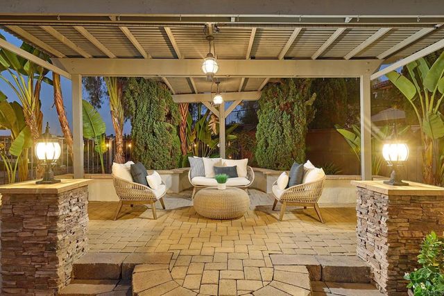 a view of swimming pool with patio