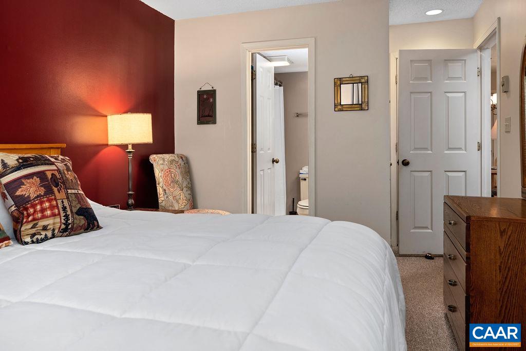 2031 Stone Ridge Wintergreen, VA 22967 - Photo 13 of 23 a bedroom with a bed and a lamp