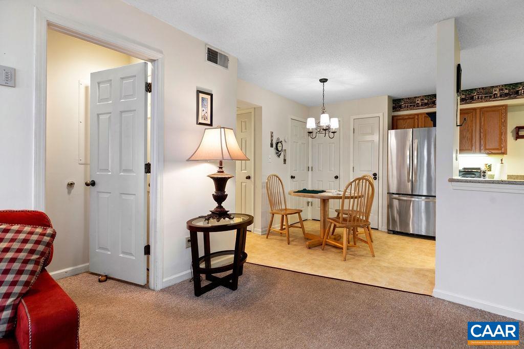 2031 Stone Ridge Wintergreen, VA 22967 - Photo 5 of 23 a view of a livingroom with furniture and a chandelier