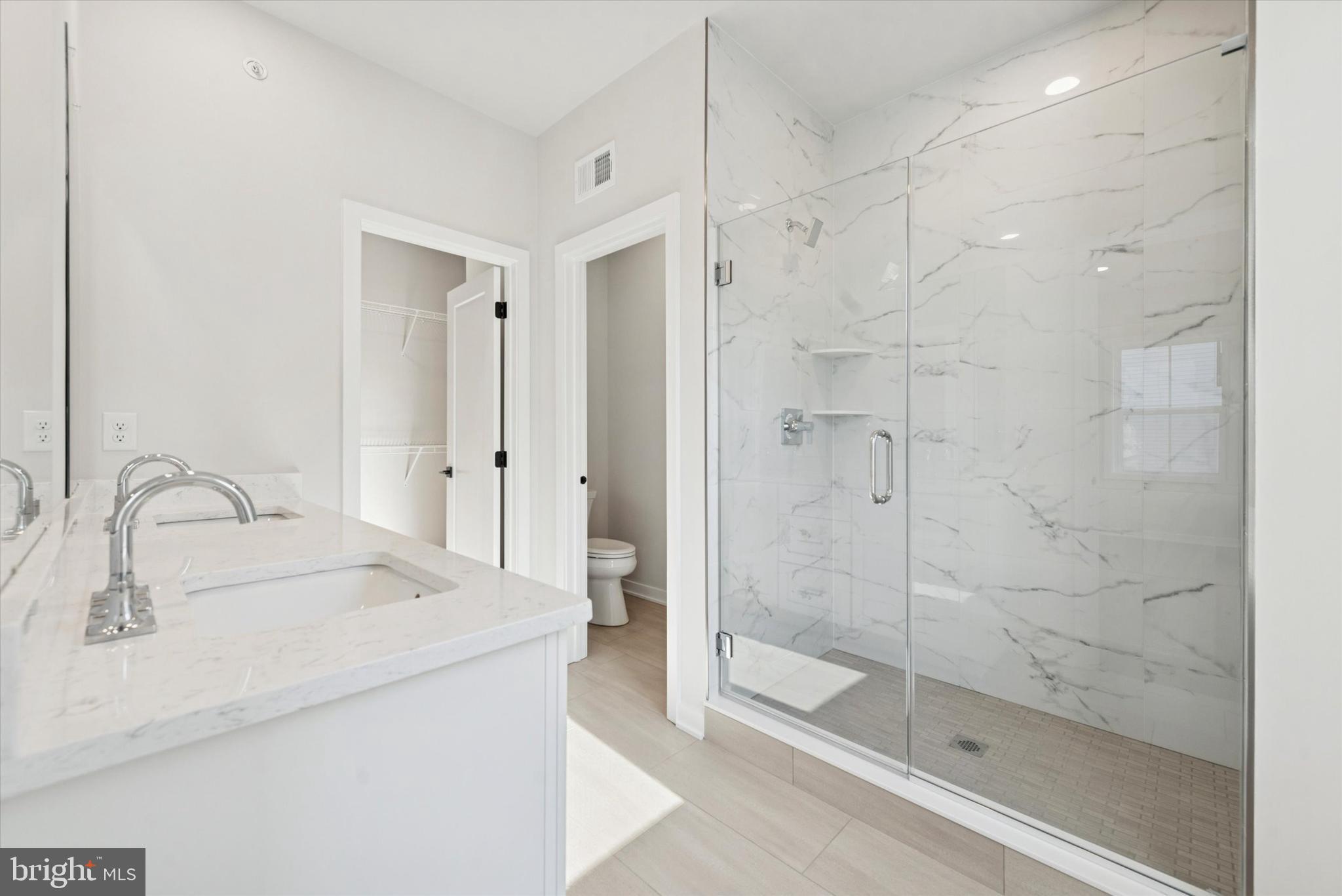 64 Alroy Road, Unit 151 Malvern, PA 19355 - Photo 9 of 19 Primary Bath, 2 sinks, walk in Shower and 2nd clos