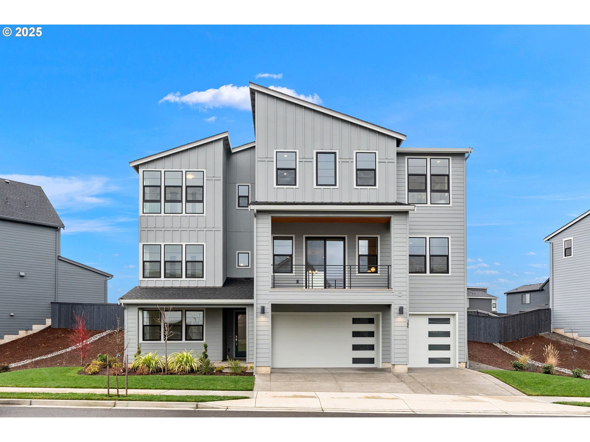 a front view of a building with a road