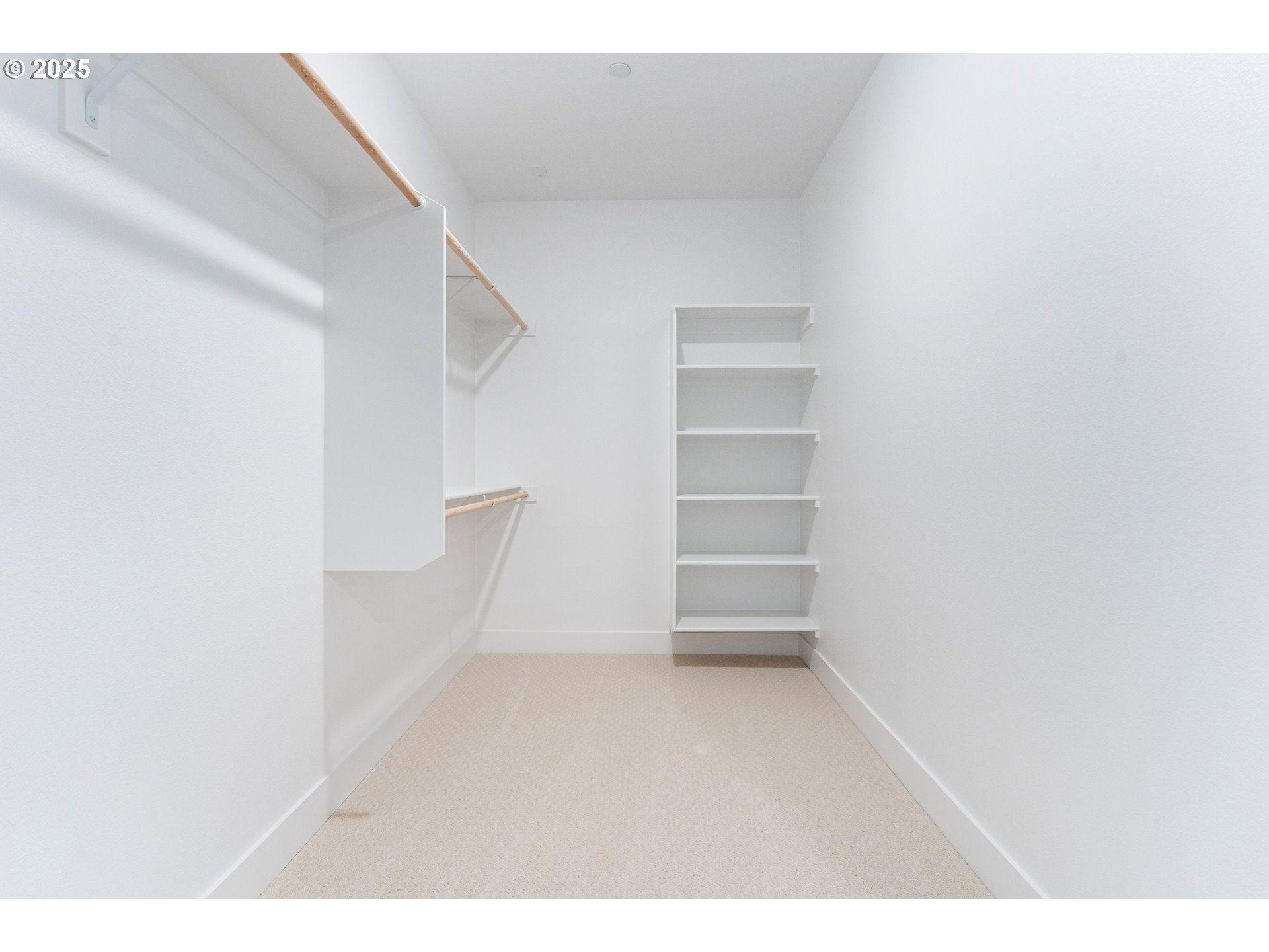 386 West Fir Loop Washougal, WA 98671 - Photo 37 of 45 a view of walk in closet with empty racks