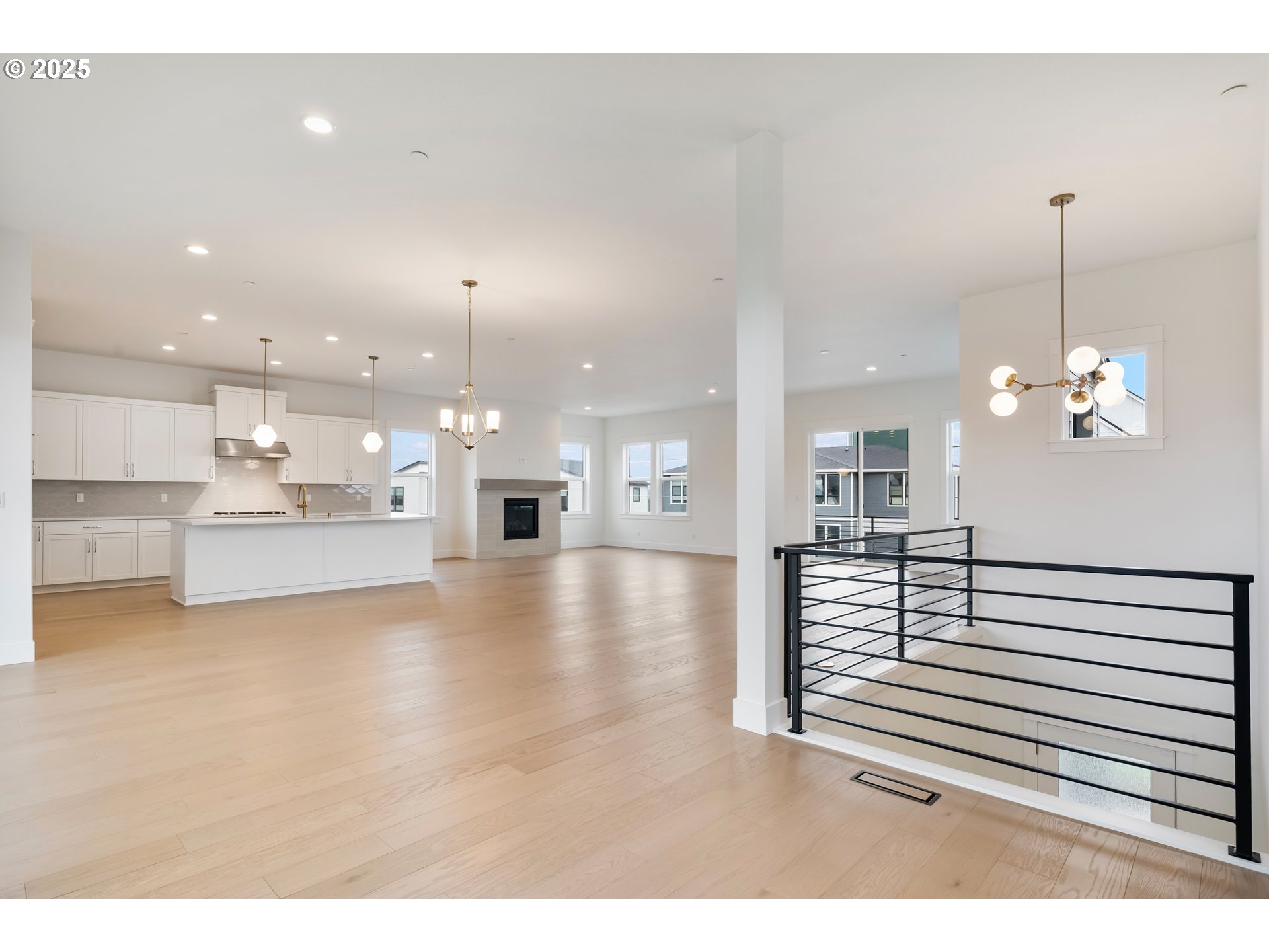 386 West Fir Loop Washougal, WA 98671 - Photo 6 of 45 a view of a living room and kitchen with furniture