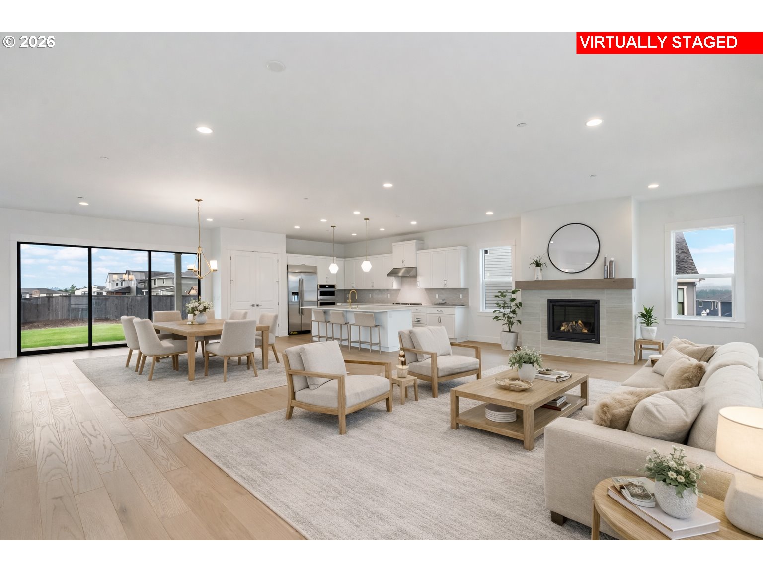 386 West Fir Loop Washougal, WA 98671 - Photo 8 of 45 a living room with furniture two fireplace and a floor to ceiling window