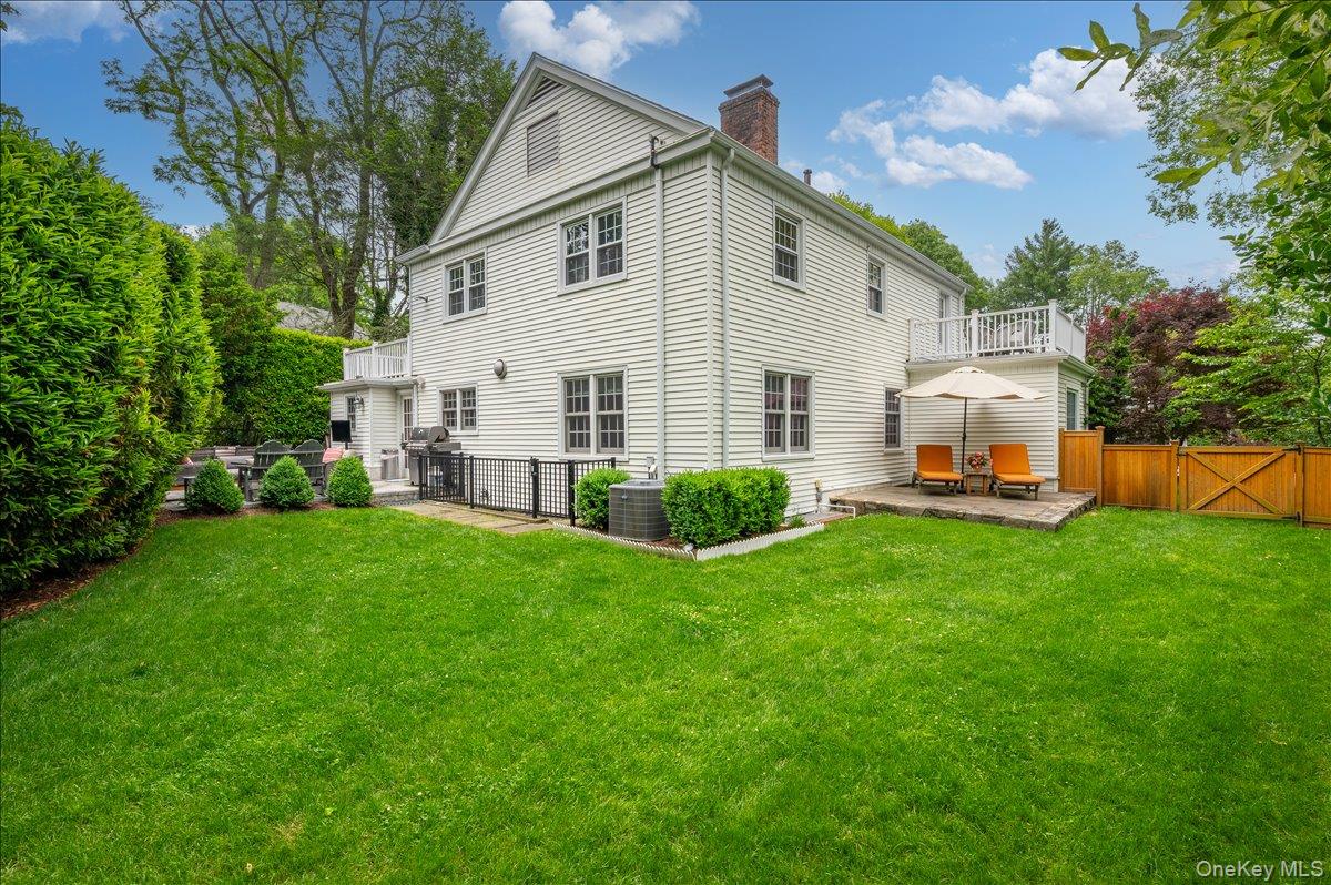 49 Eton Road Larchmont, NY 10538 - Photo 22 of 34 a view of a house with backyard