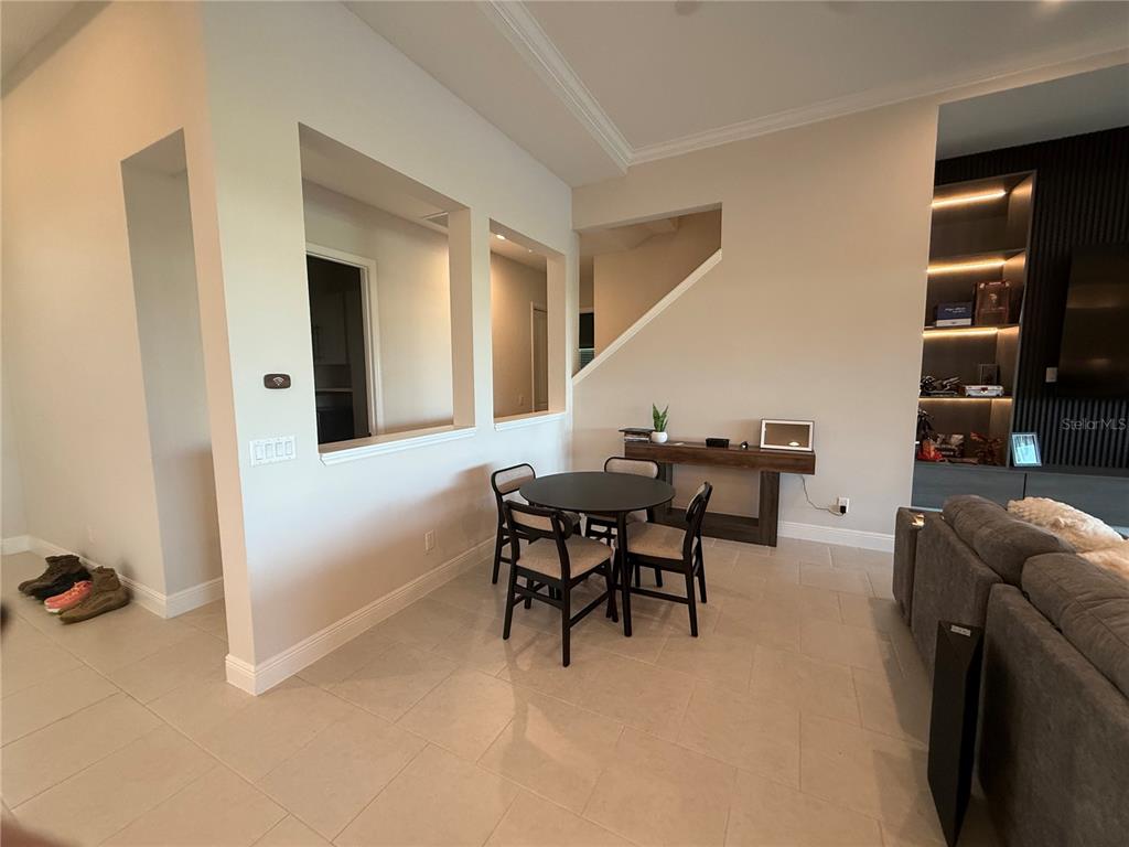 10958 Rustic Timber Loop San Antonio, FL 33576 - Photo 17 of 48 a workspace with furniture and window