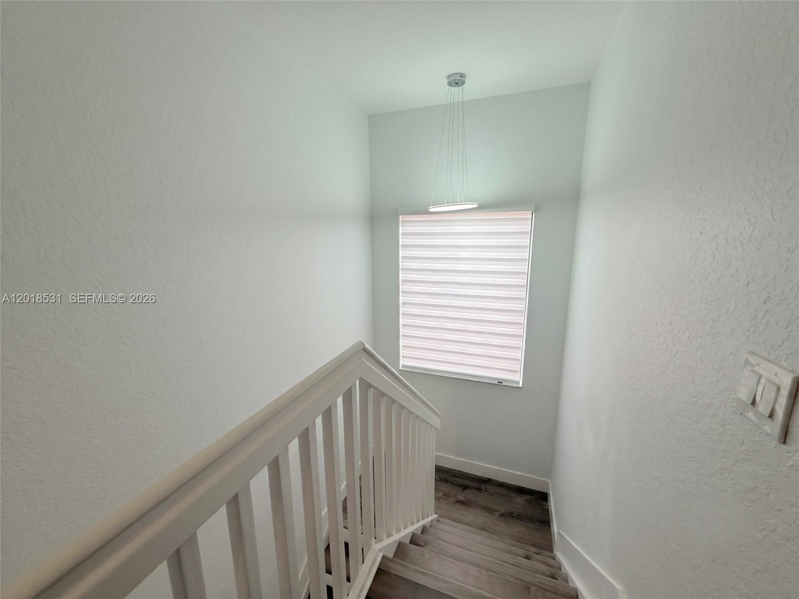 1575 Southeast 20th Road Homestead, FL 33035 - Photo 8 of 19 a view of entryway with wooden floor