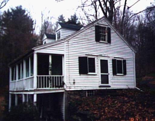 4 Old Weston Road Weston, CT 06883 - Photo 1 of 1 a view of a house with a yard