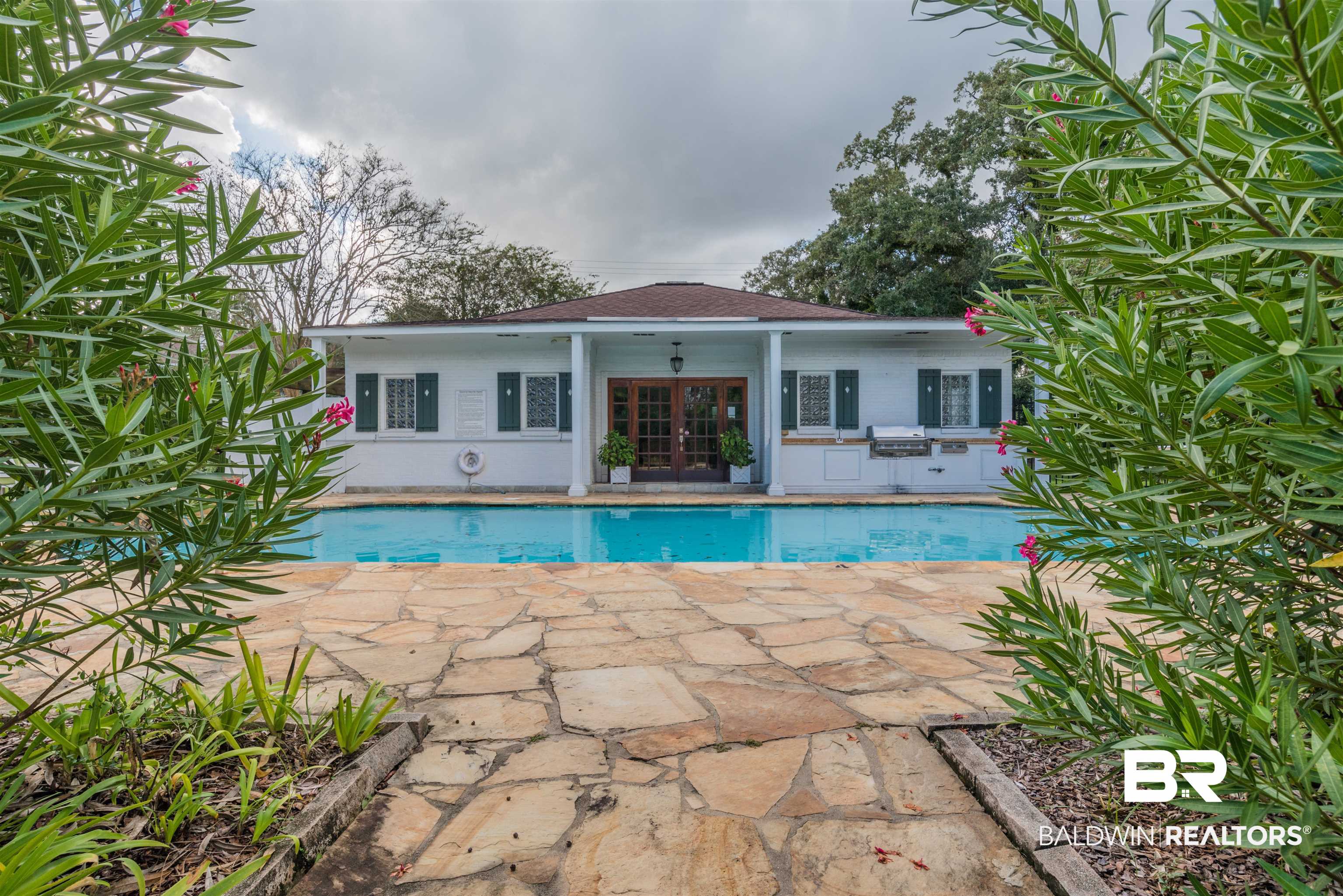 214 Upham Street, Unit 7C Mobile, AL 36607 - Photo 31 of 32 Outdoor pool featuring french doors, a patio area, and grilling area