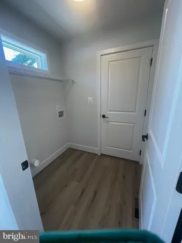 a view of small space with wooden floor