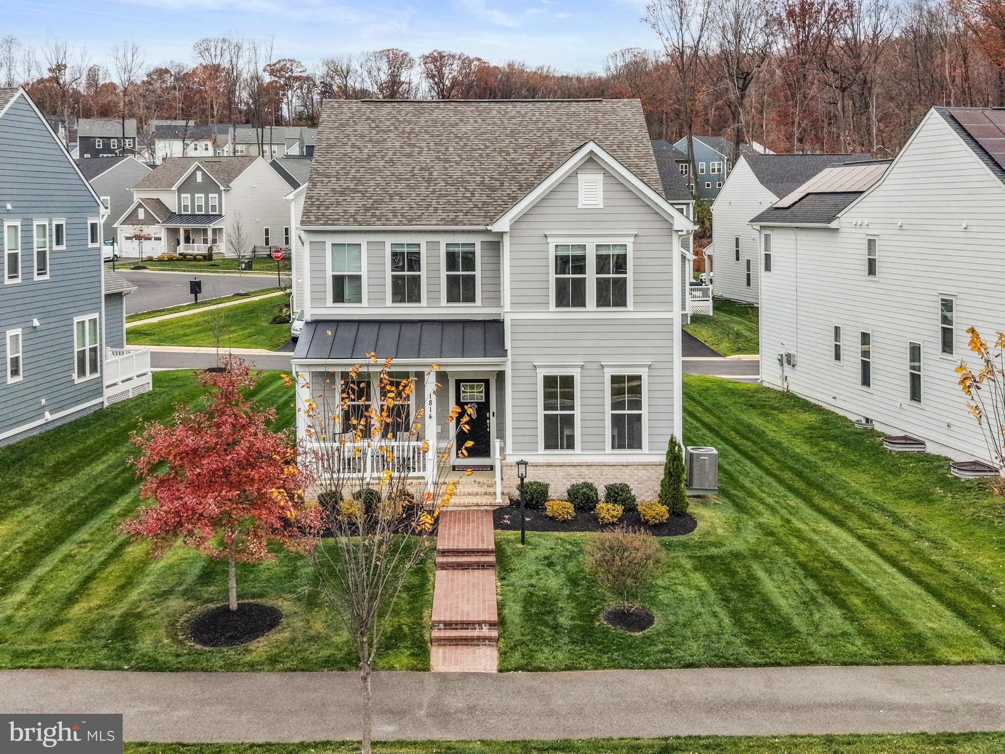 1814 River Heritage Boulevard Dumfries, VA 22026 - Photo 1 of 55 a front view of a house with garden